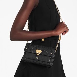 **SOLD** LIKE NEW Louis Vuitton Vavin Chain Wallet